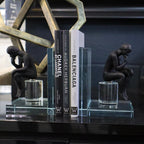 Decorative bookends with books on a shelf