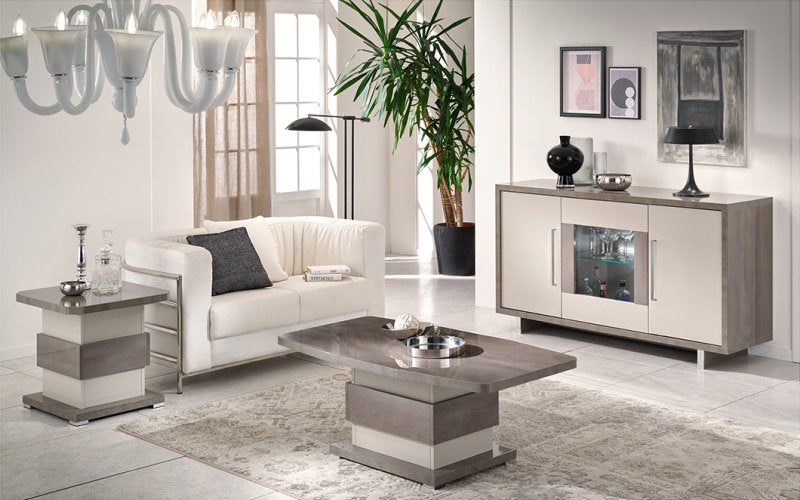 Modern living room with white sofa, coffee table, and sideboard.