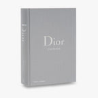 Gray book titled 'Dior Catwalk' on a white background