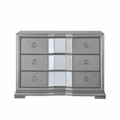 Silver mirrored dresser with six drawers on a white background