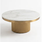 Cassa round coffee table with white marble-effect top and fluted champagne gold base