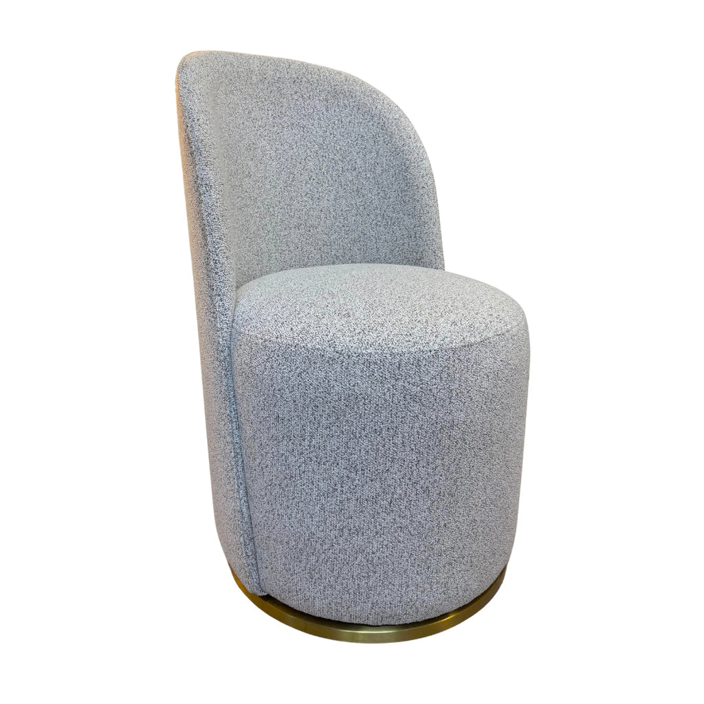 Amanda swivel dining chair in grey boucle with brushed brass base