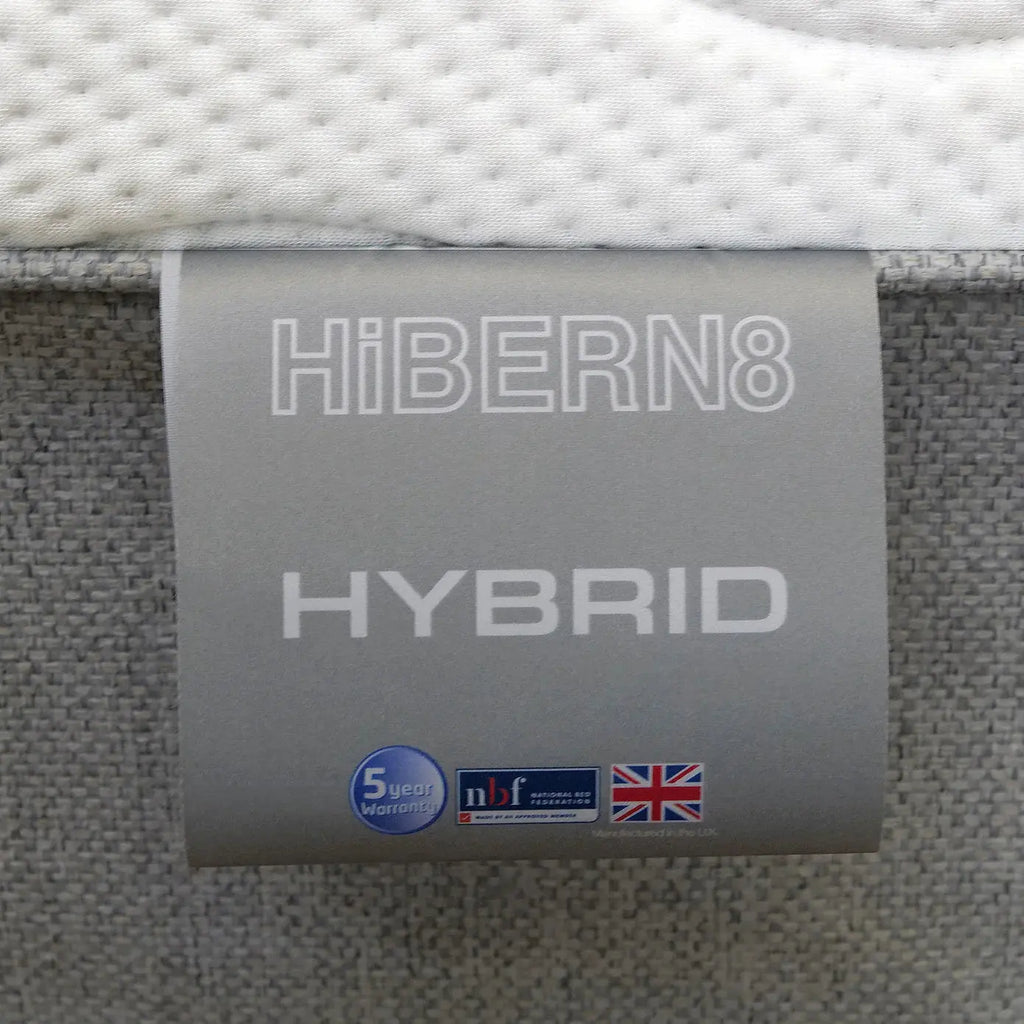 Hibern8 hybrid mattress tag with branding and certification logos.