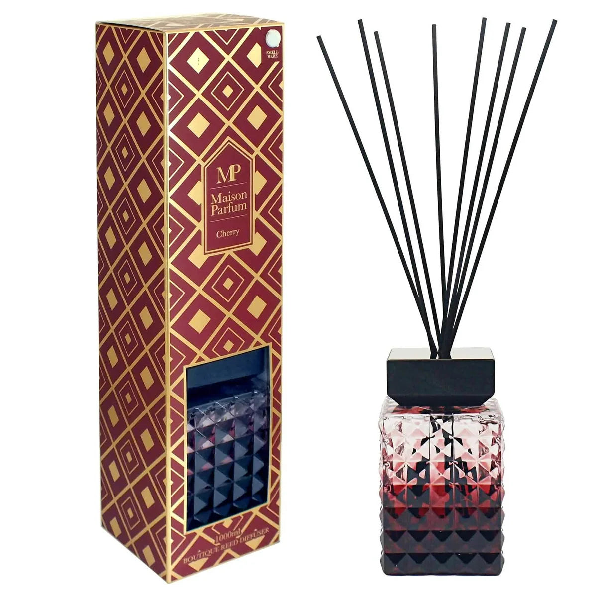 Maison Parfums Cherry reed diffuser set with a faceted glass bottle, black reeds, and a patterned red and gold retail box on a white background.