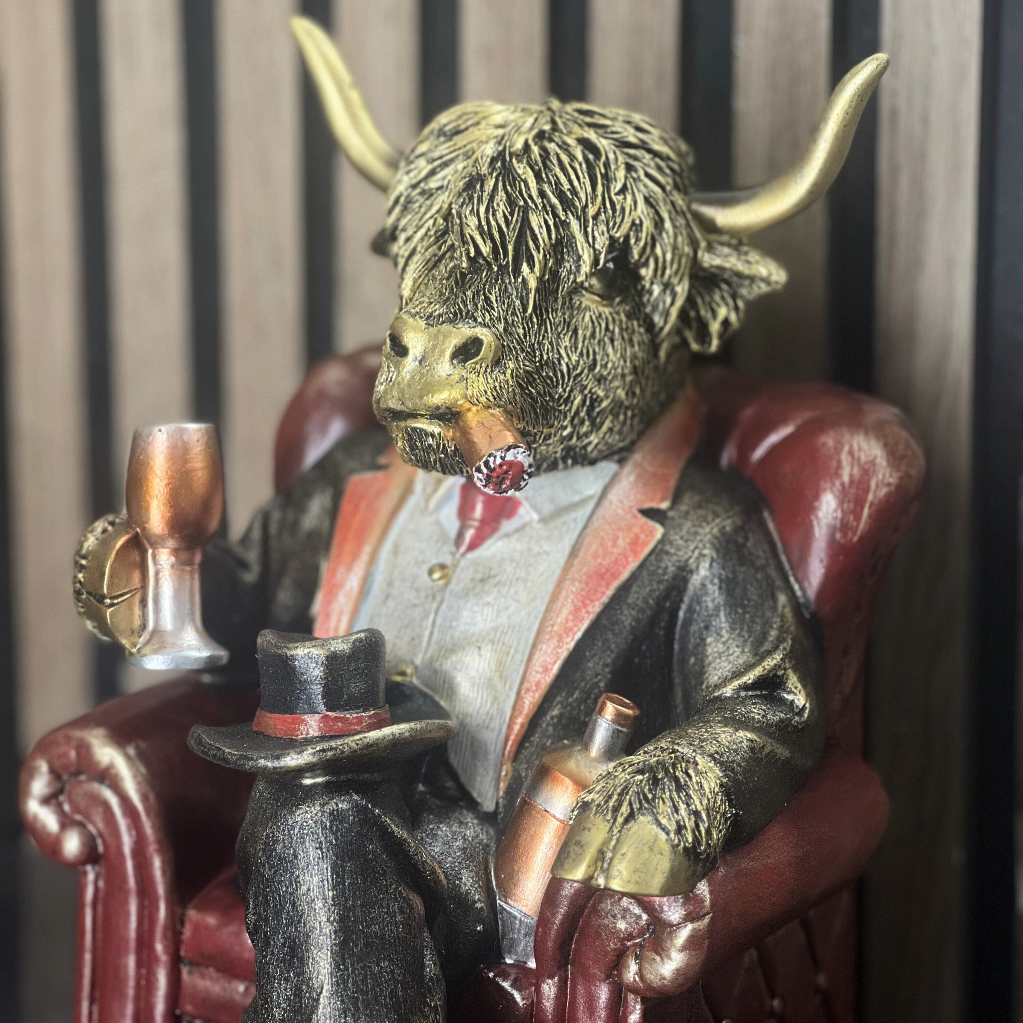 Highland Cow in Armchair Home Ornament Lesser & Pavey Ltd