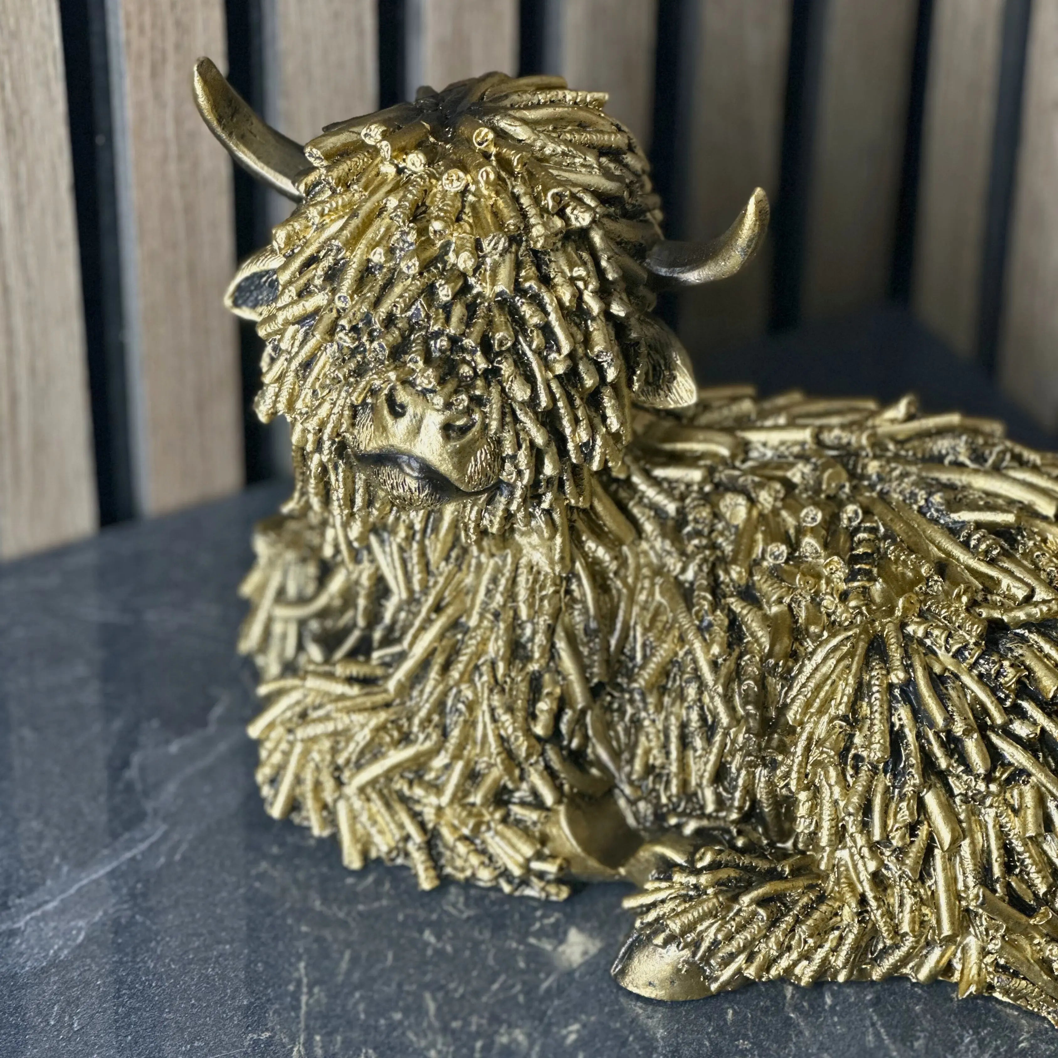 Gold Shaggy Highland Cow Lying Lesser & Pavey Ltd