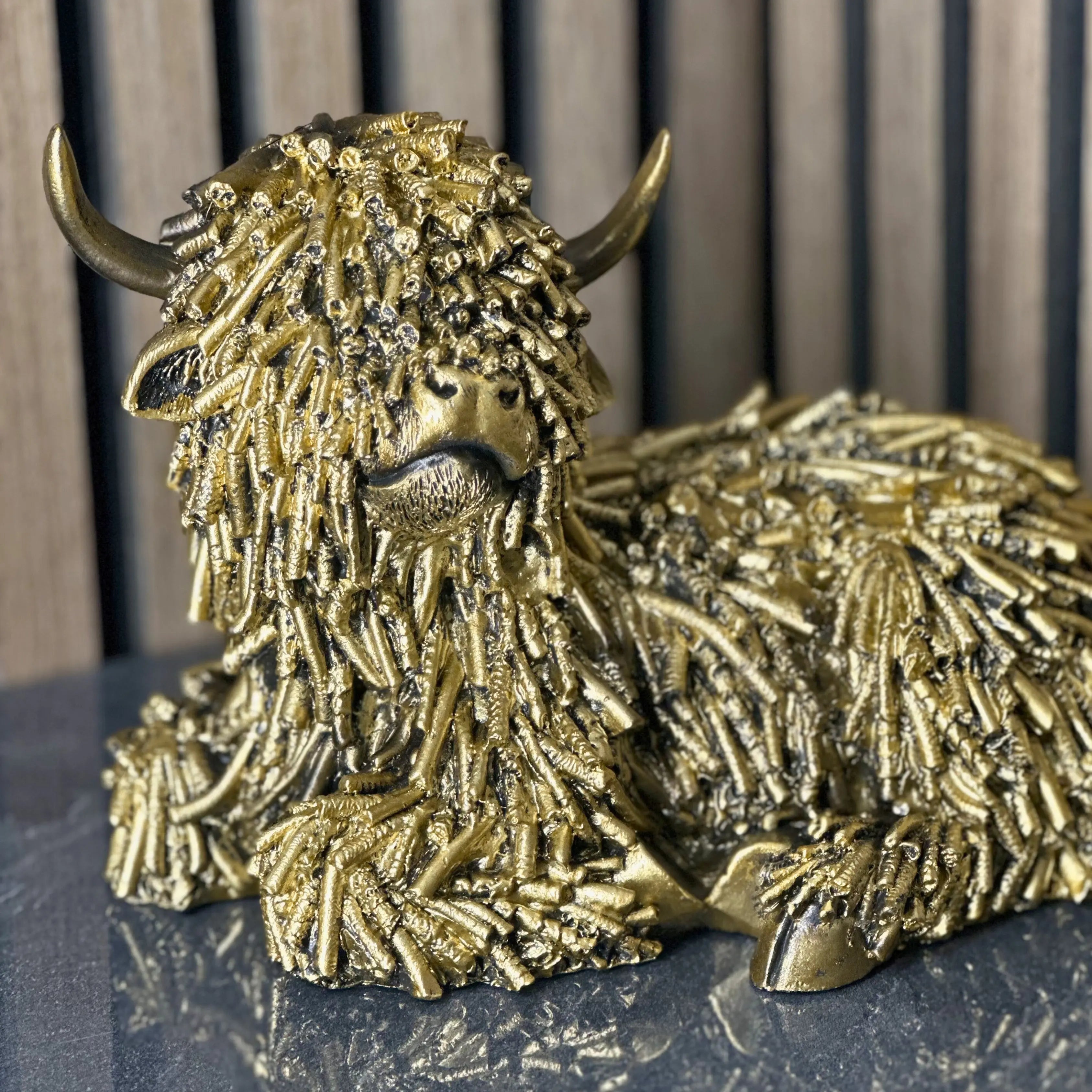Gold Shaggy Highland Cow Lying Lesser & Pavey Ltd