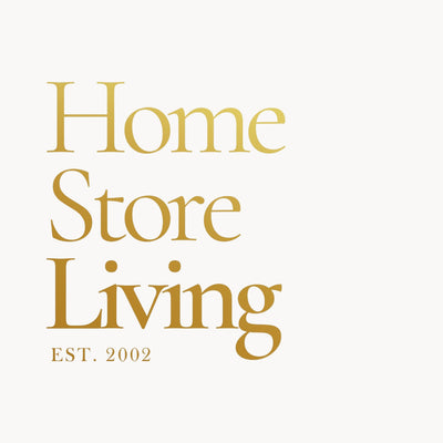 Gold text 'Home Store Living EST. 2002' on a white background