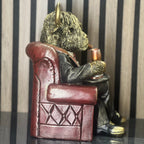 Highland Cow in Armchair Home Ornament Lesser & Pavey Ltd